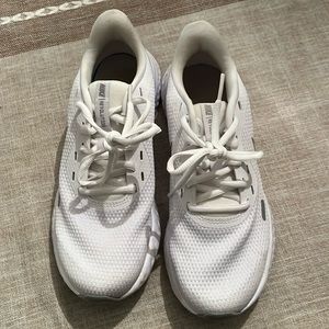 White Nike running shoes. Worn twice